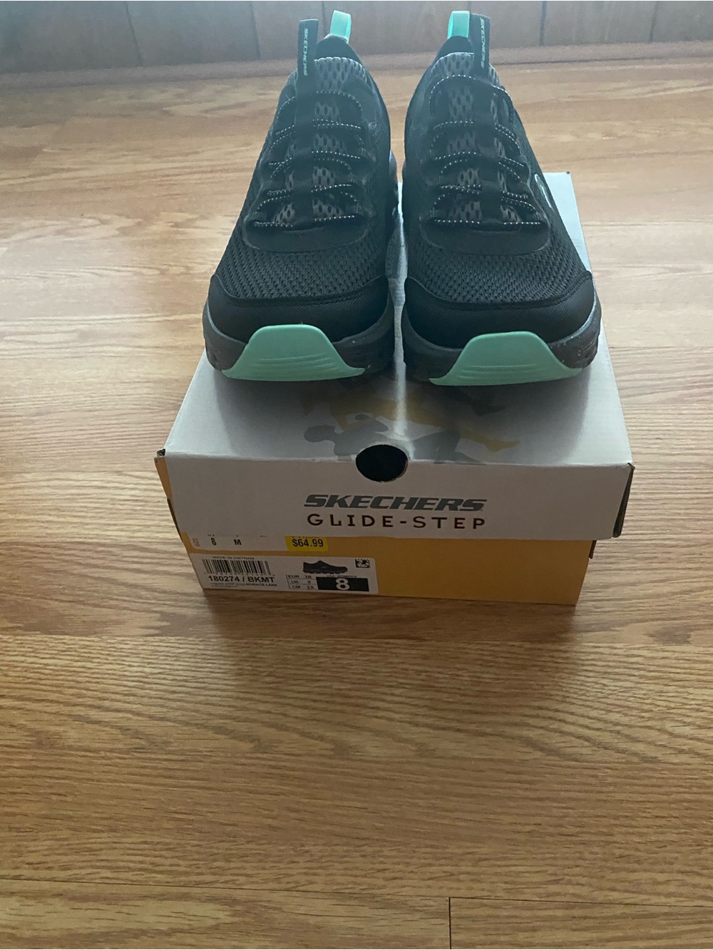 Womens Sketchers Glide Step Black Slip-On Sneakers with Mint Accents